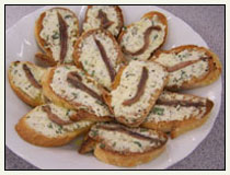 Moroccan Anchovy and Ricotta Crostini